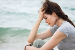 Stress Accelerates Aging, Stressed Woman By Sea
