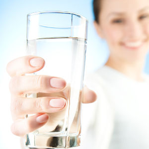 girl-holding-glass-of-water